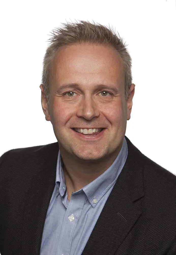 A man smiling for the camera